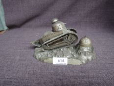 A WW1 related Inkwell, Silver Plated Tank going over Trenches bearing signature Ouveb