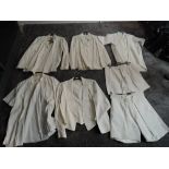 A collection of mid 20th century British Navy White Uniform including two No1 Dress Tunics without