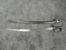 A mid 19th century British Light Cavalry Sword, stirrup guard, wire and leather grip, double langet