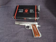 A Denix reproduction metal with wood grip Automatic 45 Government Model M1911A1 US Army, boxed