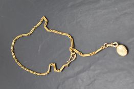 A gold plated fancy link watch chain with 15ct gold clasp and small yellow metal locket