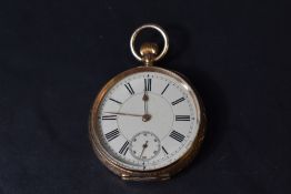 A small yellow metal top wound pocket watch stamped 14K having Roman numeral dial with subsidiary