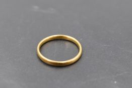 A Georgian gold wedding band of plain form, probably 22ct gold, size N & 2.2g