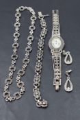 Three pieces of silver and marcasite jewellery including necklace, bracelet and quartz wrist watch