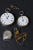A small silver key wound pocket watch having Arabic numeral dial to decorative face in engraved