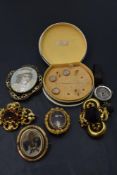 Five vintage brooches having pinchbeck mounts, including reversible hair locket, a part set of
