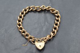 A 9ct gold curb chain bracelet having padlock clasp, approx 40.3g