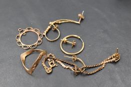 A small selection of yellow metal and 9ct gold jewellery including earrings, wishbone ring, chain