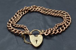 A 9ct rose gold converted watch chain bracelet with padlock clasp, approx 31.3g