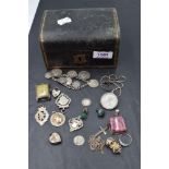 A small vintage jewellery box containing a small selection of HM silver and white metal including