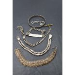 Four pieces of HM silver and white metal including bracelets, bangle and watch chain