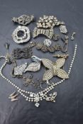 A selection of vintage diamante and cut steel jewellery including buckles, bracelet, brooches etc