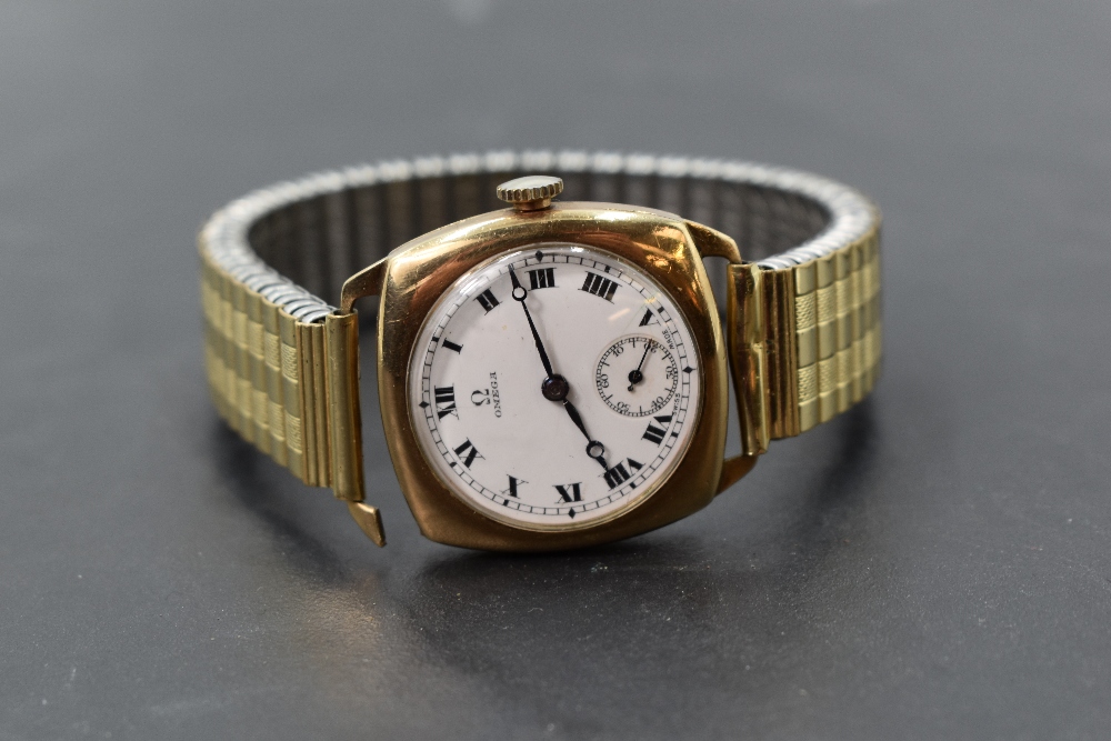 A gent's vintage Omega 9ct gold wrist watch, no: 8795979, having Roman numeral dial with