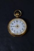 A small Edwardian 18ct gold top wound pocket watch by Waltham no:12978654 having Arabic numeral dial