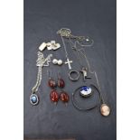 A selection of white metal and HM silver jewllery including pendants, cufflinks, earrings, cameo