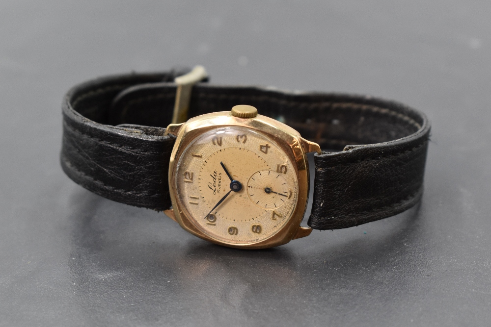 A gent's vintage 9ct gold Leda wrist watch having Arabic numeral dial with subsidiary seconds in