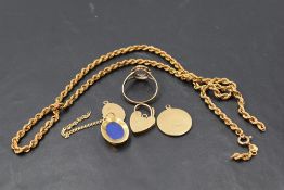 A small selection of 9ct gold and yellow metal jewellery including St Christopher pendants,