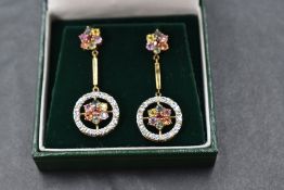 A pair of multi coloured (fancy) sapphire earrings having multi coloured sapphire clusters with