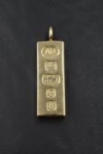 A 9ct gold ingot pendant having oversized hallmarks, approx 53.3g