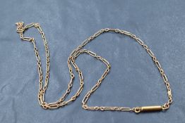 A yellow metal fancy link chain bearing plaque stamped 9C and having barrel clasp, approx 17' & 2.