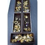 A carved treen five drawer antique jewellery chest with lockable front door, of small size having