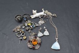 A small selection of Hm silver and white metal jewellery including rings, brooches, earrings,