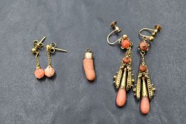 A pair of screw back Victorian yellow metal earrings stamped 9ct having coral chandelier drops, a