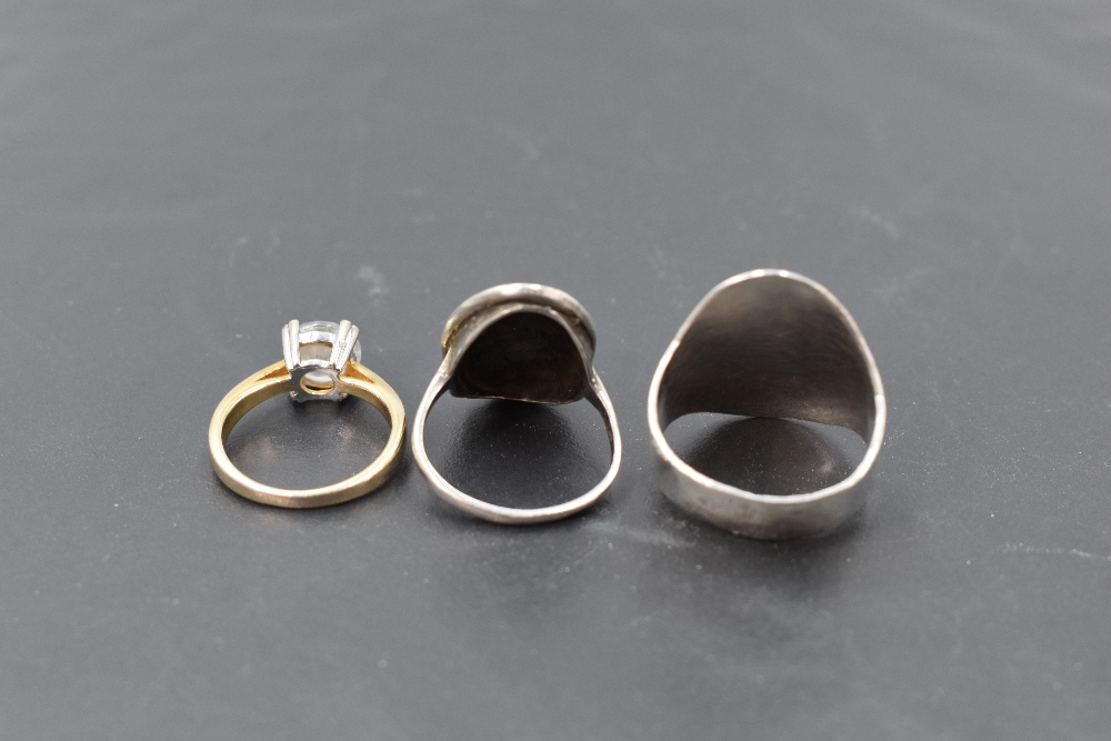 Three silver rings of various forms including Cubic zirconia and stylised - Image 2 of 2