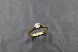 A diamond solitaire ring, approx 0.45ct in a claw set raised mount on an 18ct gold loop, size N &