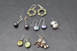 Five pairs of silver and pearl and mineral loop drop earrings including moonstone, baroque pearl