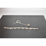 A silver articulated four bar wave style bracelet, approx 7.5' & 15.1g and a facetted crystal