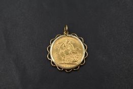 A gold sovereign dated 1905 in a removable 9ct gold pendant mount, approx 9.6g