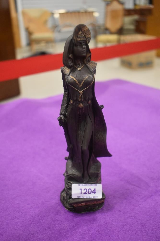 A modern resin cast limited edition figure of an Egyptian lady