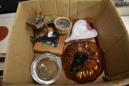 A selection of curios including an art glass pumpkin, a spelter donkey and a stamp head