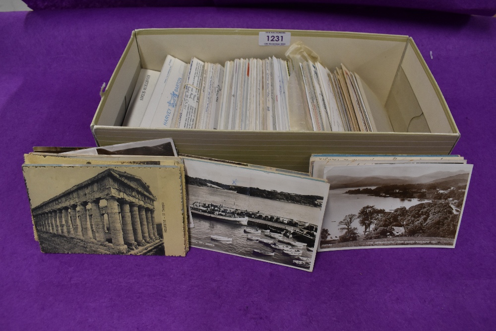 A box of postcards, various ages and interest, including early 20th century.