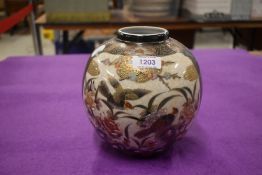 A modern Japanese Satsuma ware ginger jar decorated with birds of paradise and crackle glaze