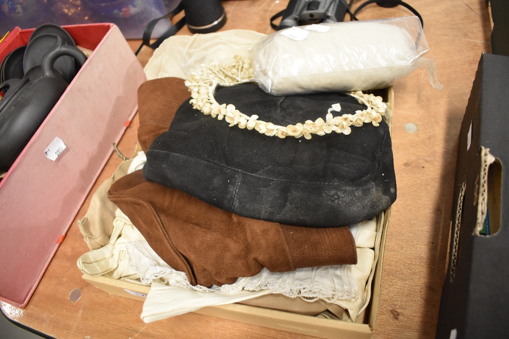 A selection of ladies textiles including bucket hat, suede handbag and leather gloves