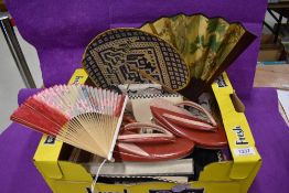 A collection of vintage oriental items including purse, fans and shoes with box