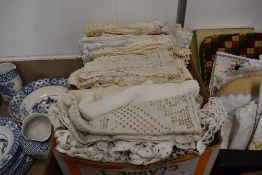 A collection of vintage and antique net curtains, crochet work and other similar items.