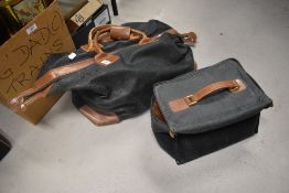 A gentleman's overnight bag and wash bag etc.