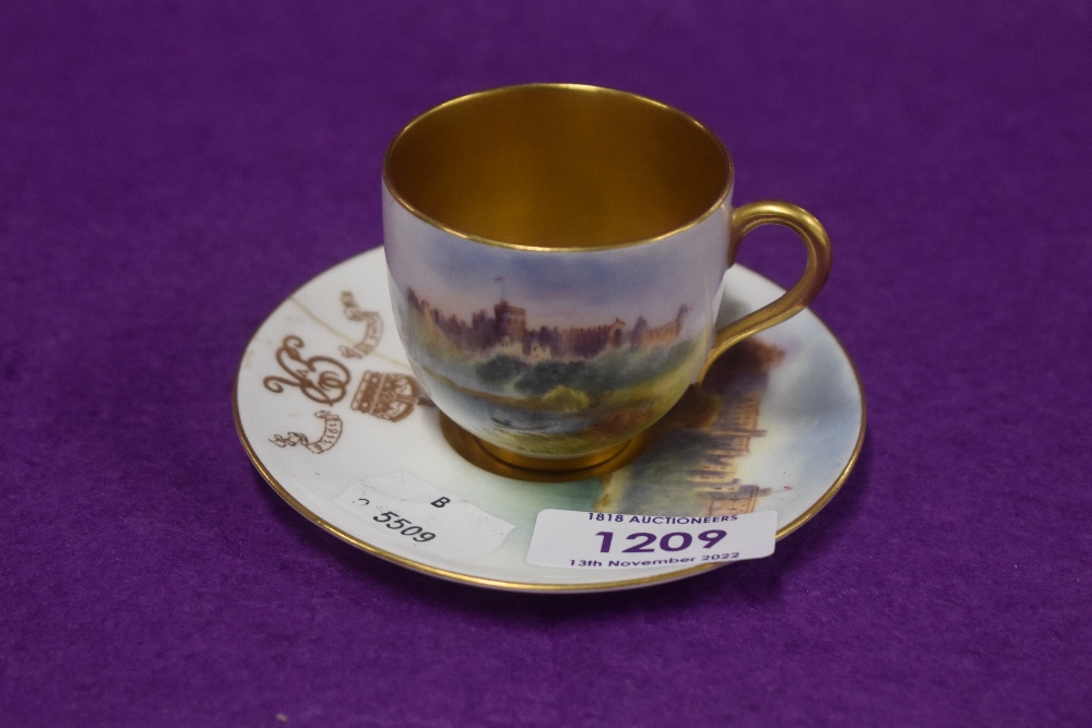 A 20th century Royal Worcester cabinet tea cup and saucer set with Royal cypher for King George