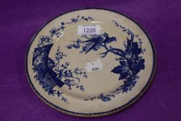 An early Victorian Stanley creamware plate with bird and crest design