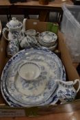 A collection of blue and white ware including part tea set and meat chargers.