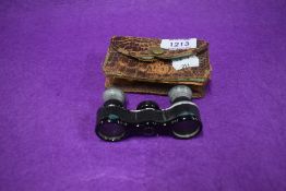 A pair of 20th century G.P Goerz opera glasses or binoculars with leather case