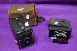 Two early Kodak cameras including Brownie no.2 and A-127