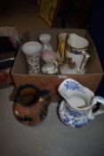 A large collection of Art Deco era ceramics including jugs, vases, rose bowls and dishes