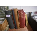 A selection of library books including the big book of gardening and Equine within