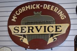 An early 20th century hand painted advertising sign for Mc Cormick Deering Service, Mechanics