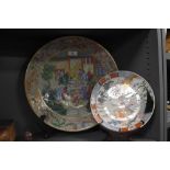 Two antique oriental porcelain plates including a large Celadon under glaze charger with famile rose