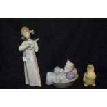 A modern Lladro figure study of a girl playing lute having damage to head, and two Nao figures one